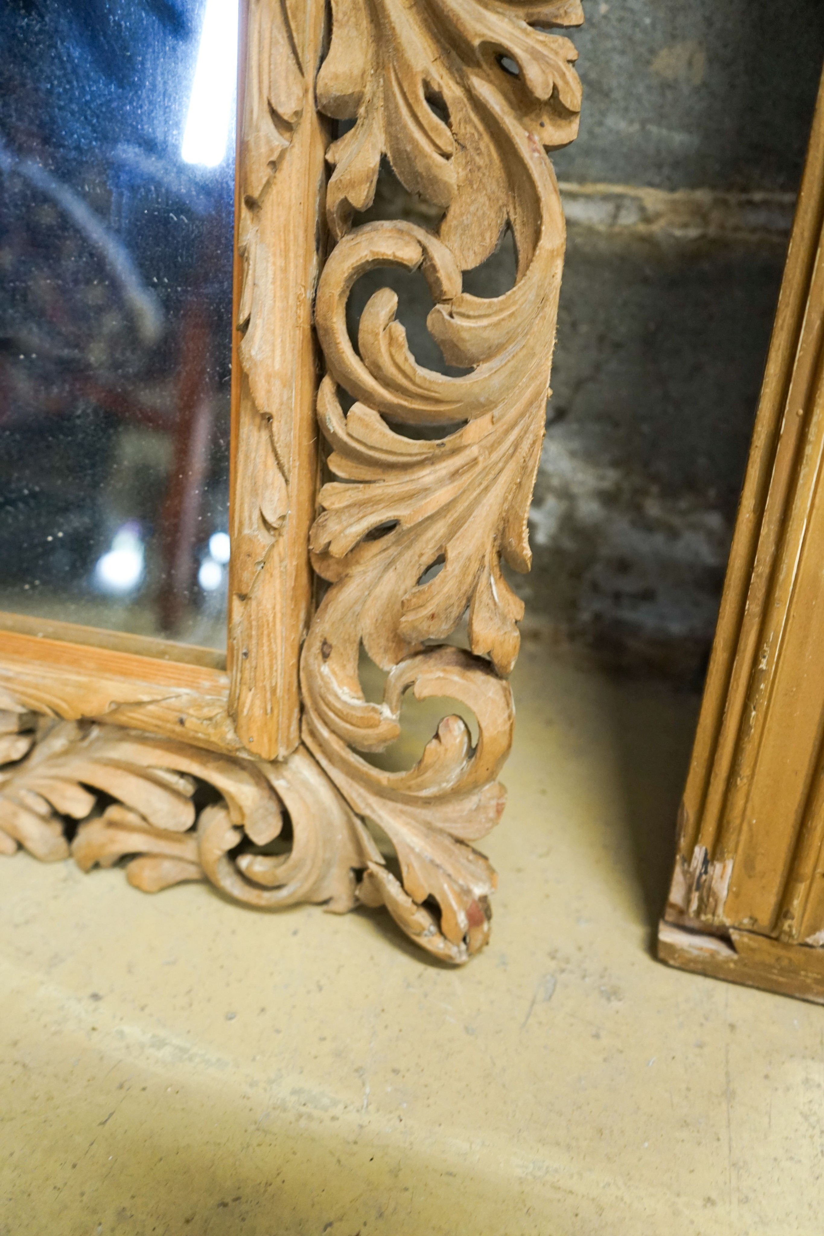 A carved oak framed rectangular wall mirror, width 65cm, height 82cm